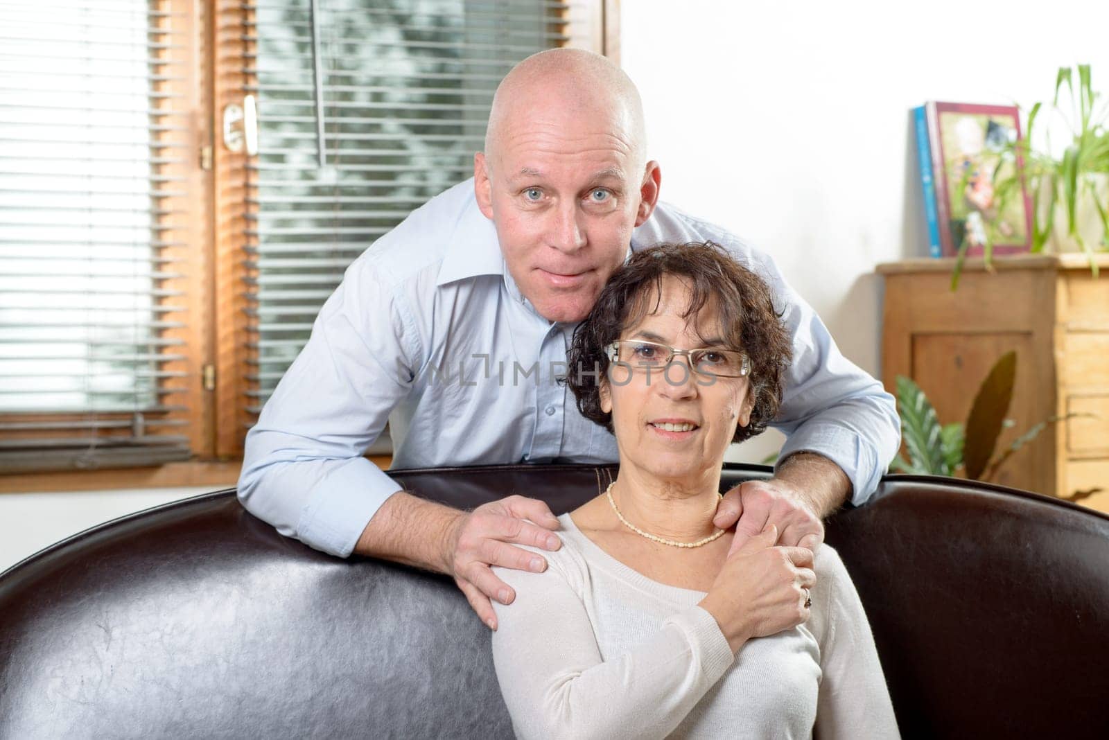 Senior couple happy on a sofa