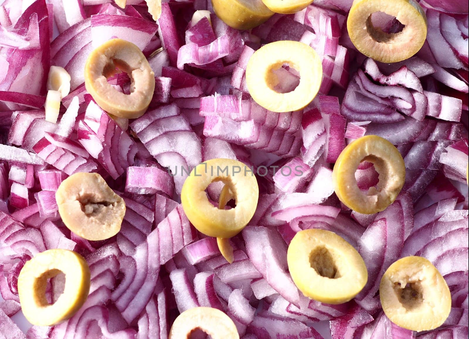 chopped red onions with olives