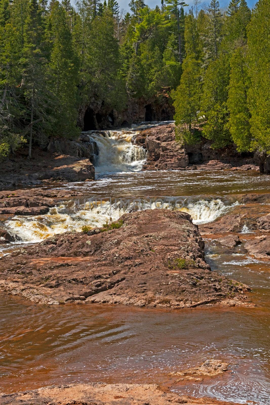Powerfall Waters Cutting Through the Pines at Fifth Falls in Gooseberry Falls State Park in Minnesota