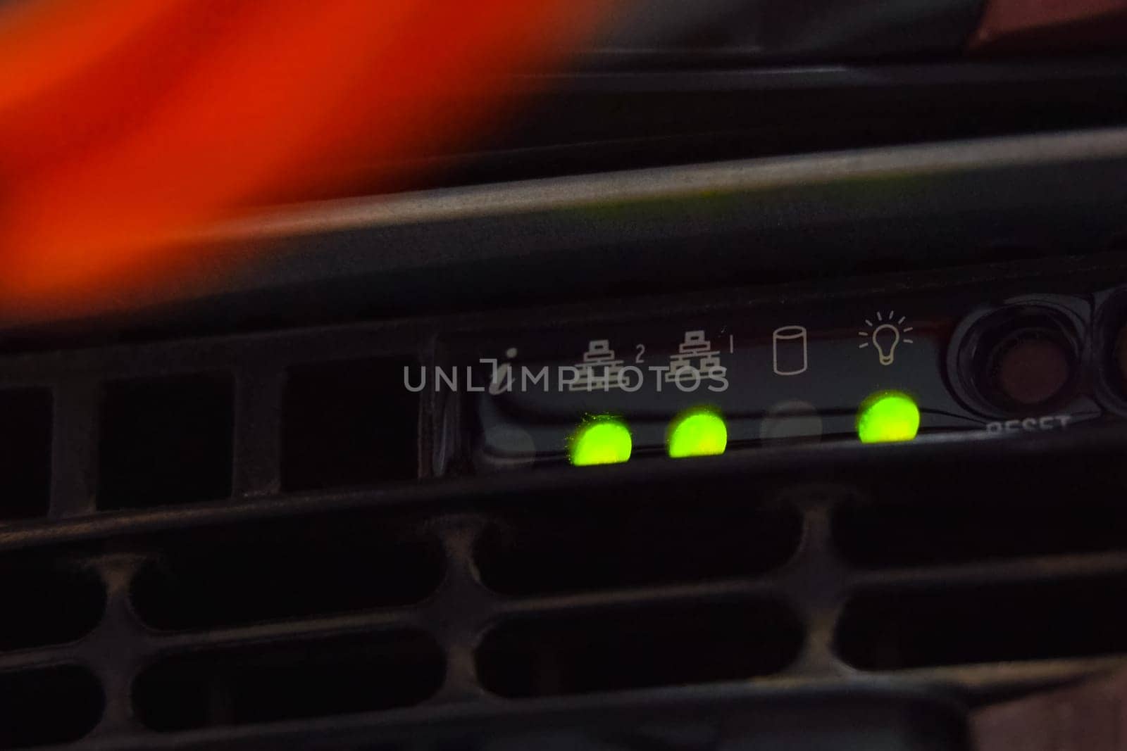 A working server. Internet wires and flashing lights on the server.