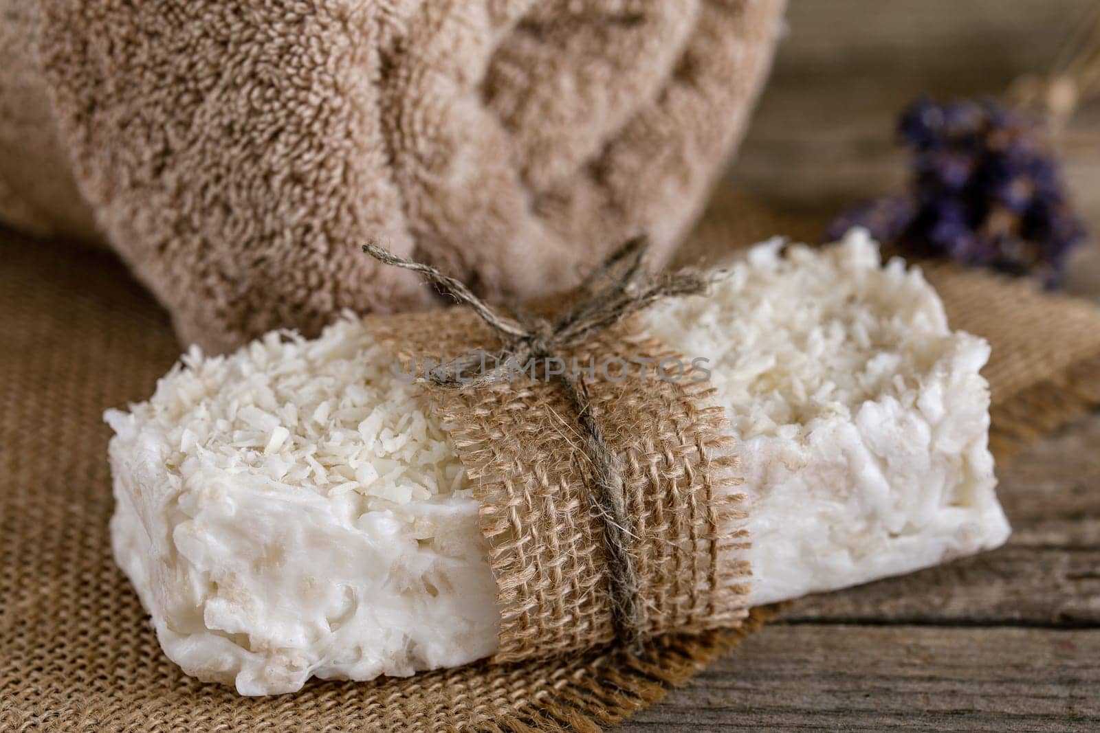 Handmade soap with natural fillers, with coconut flakes with jute decoration