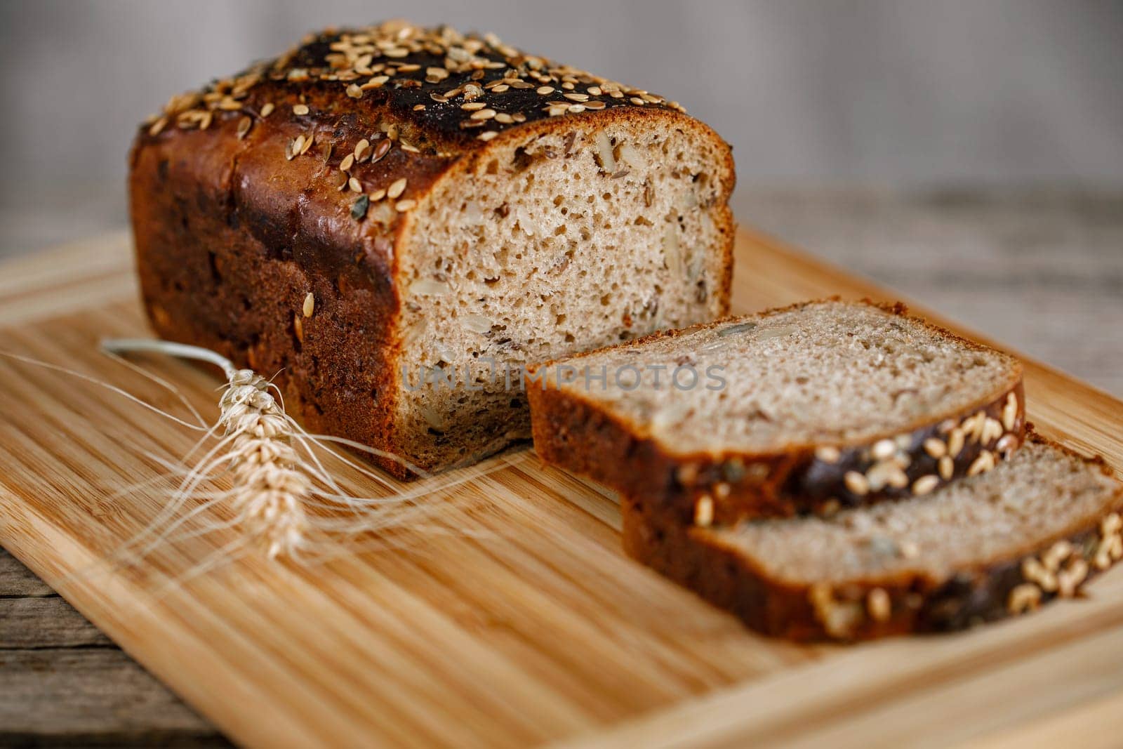 whole wheat gluten free bread with flax seads sunflower chia seads sesame. side view with copy space