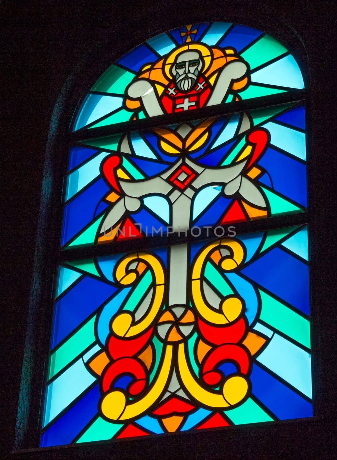 KISLOVODSK,RUSSIA- JULY 30,2016:View of the interior of the famous Armenian Apostolic Church "Surb Vardan"".Stained glass details of a beautiful colored glass mosaic window."