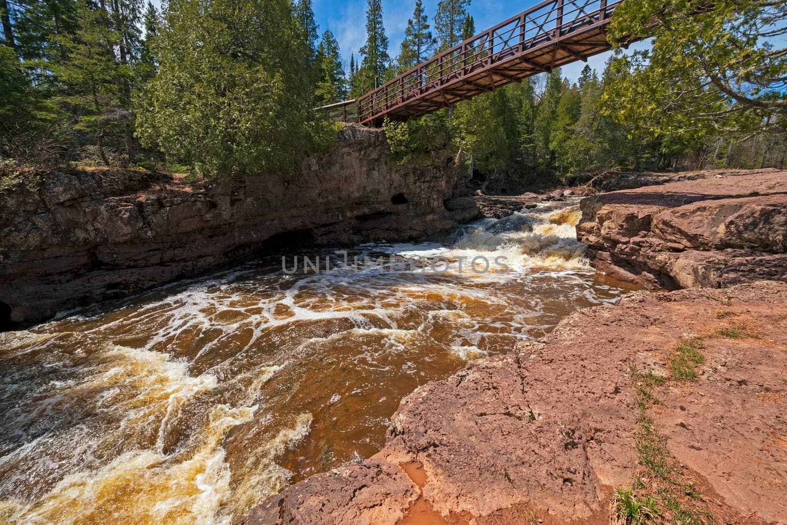 Bridge Spanning a Dramatic Cascade of the Gooseberry River in Gooseberry River State Park in Minnesota