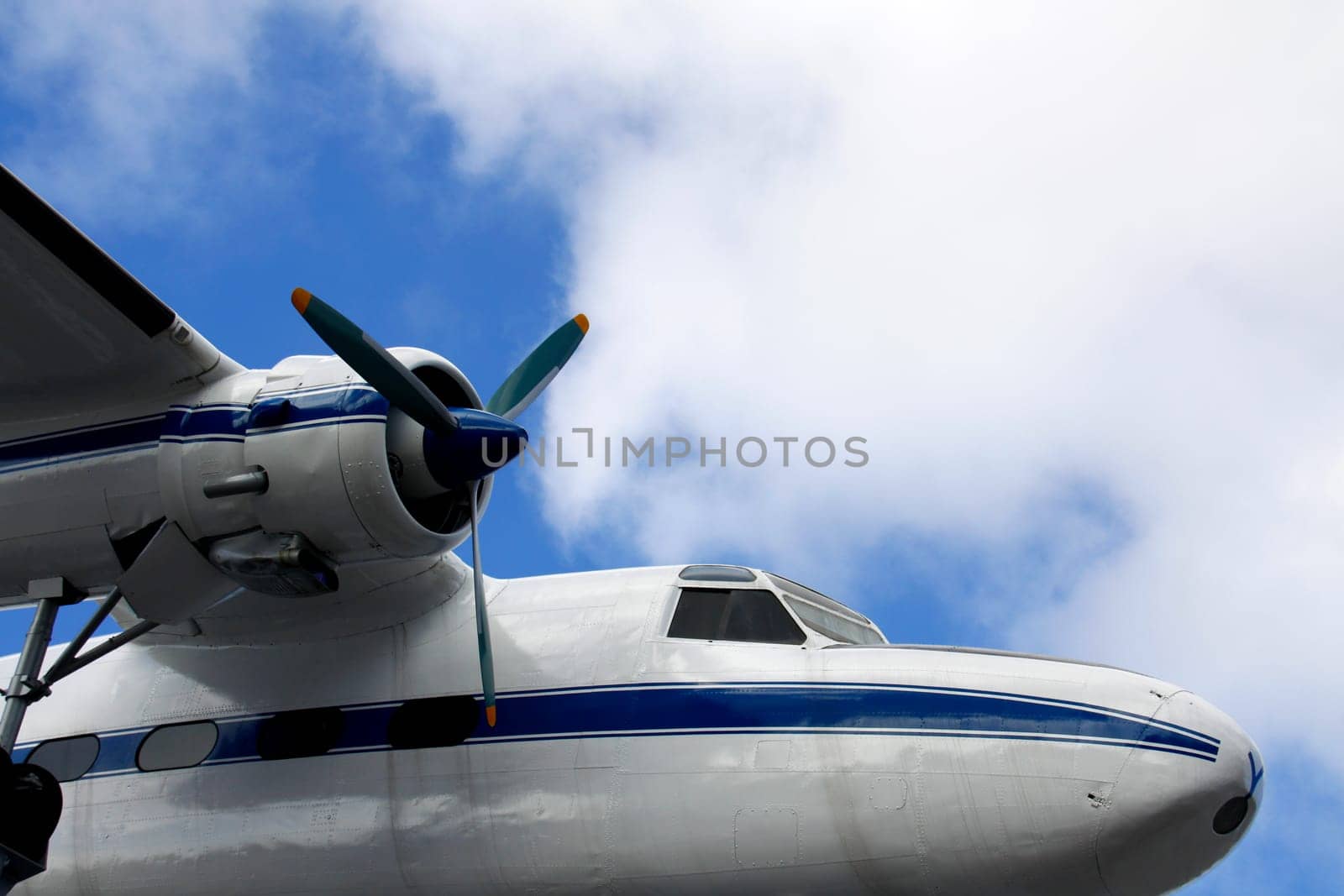 Holiday trip with a plane above the clouds