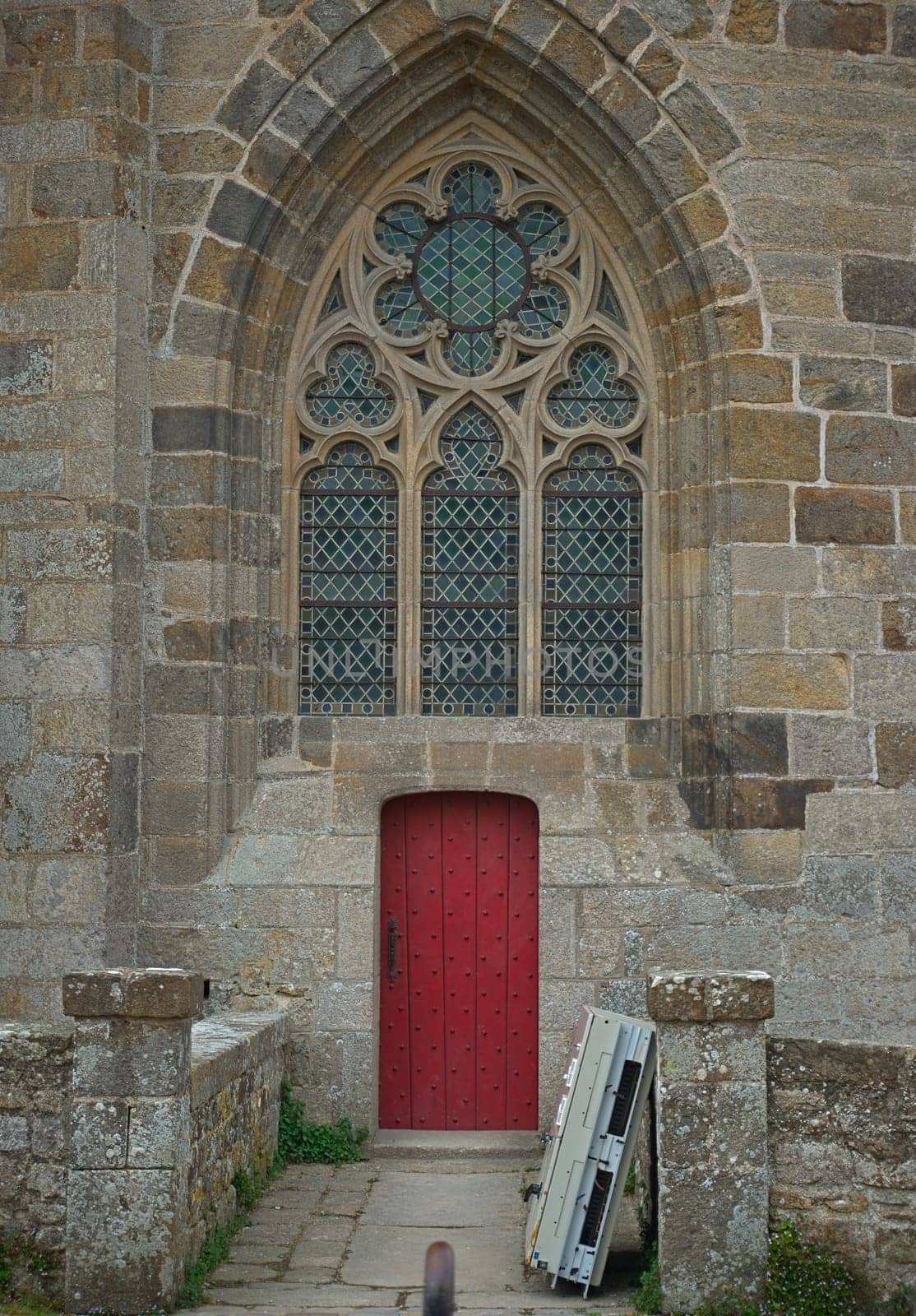 Entrance at stone gothic style catholic cathedral