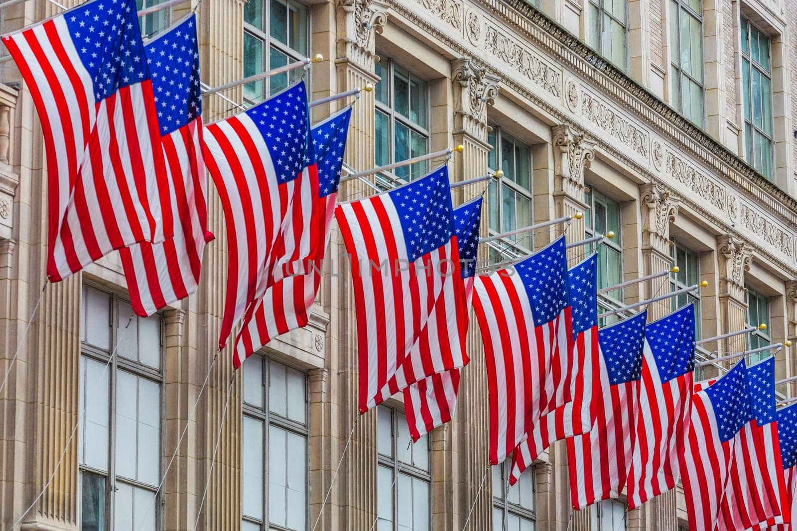 American Flags floating one of the main Manhattan Landmarks in New York City USA