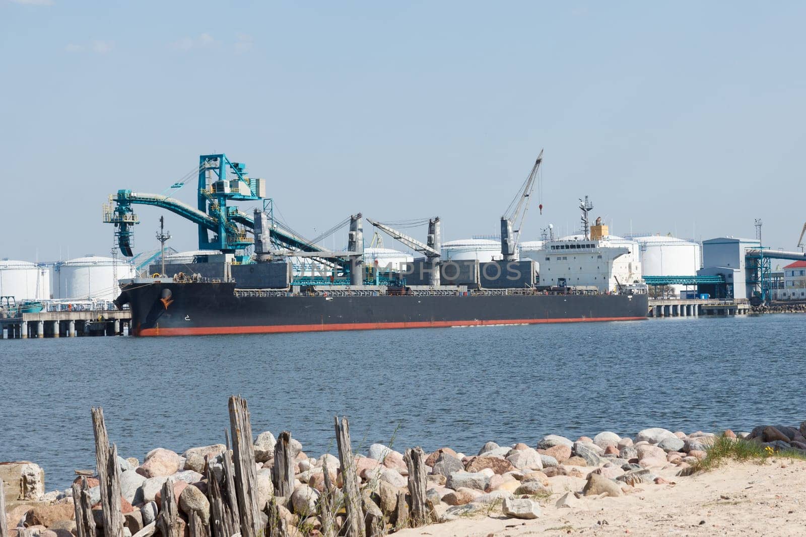 chemical tanker during unloading operation in the port