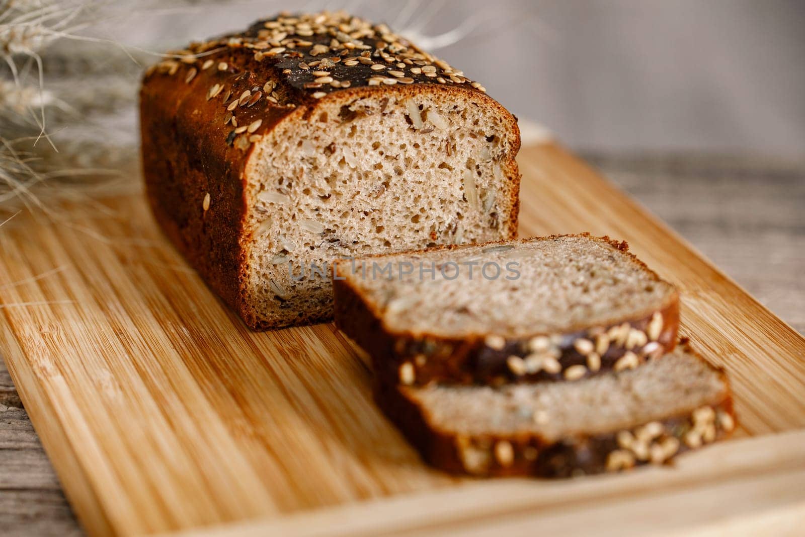 whole wheat gluten free bread with flax seads sunflower chia seads sesame. side view with copy space