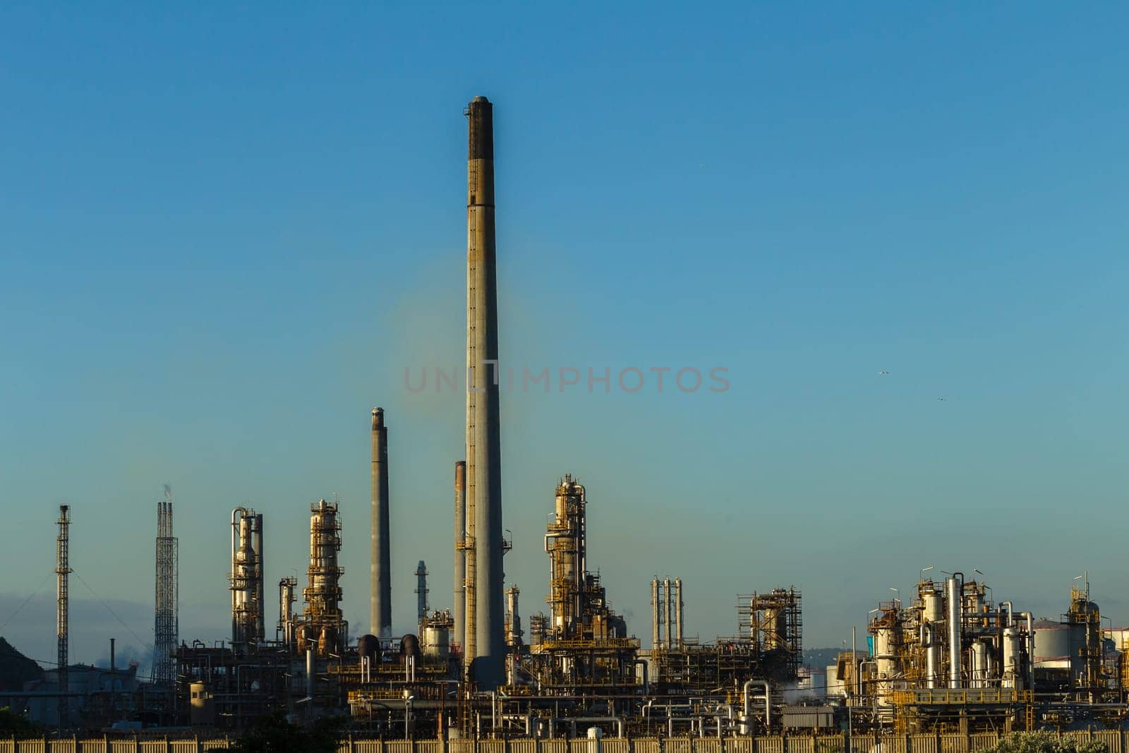 Refinery factory structures in morning light