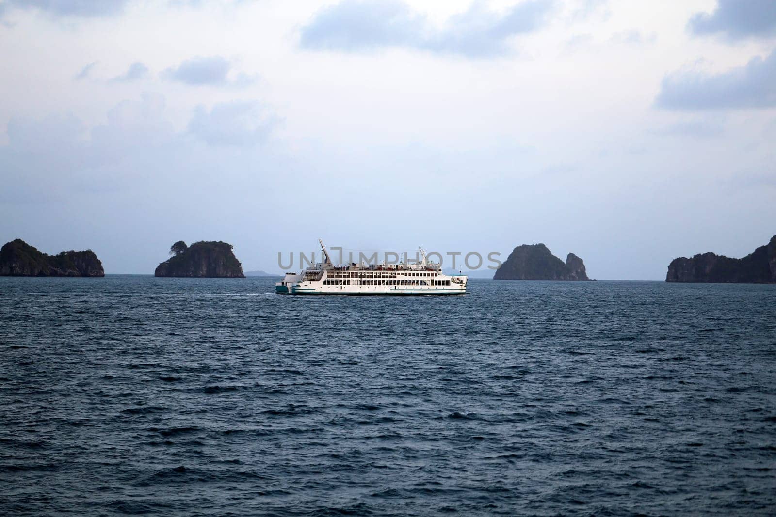 beautiful seascape with the island on the background of blue sky with