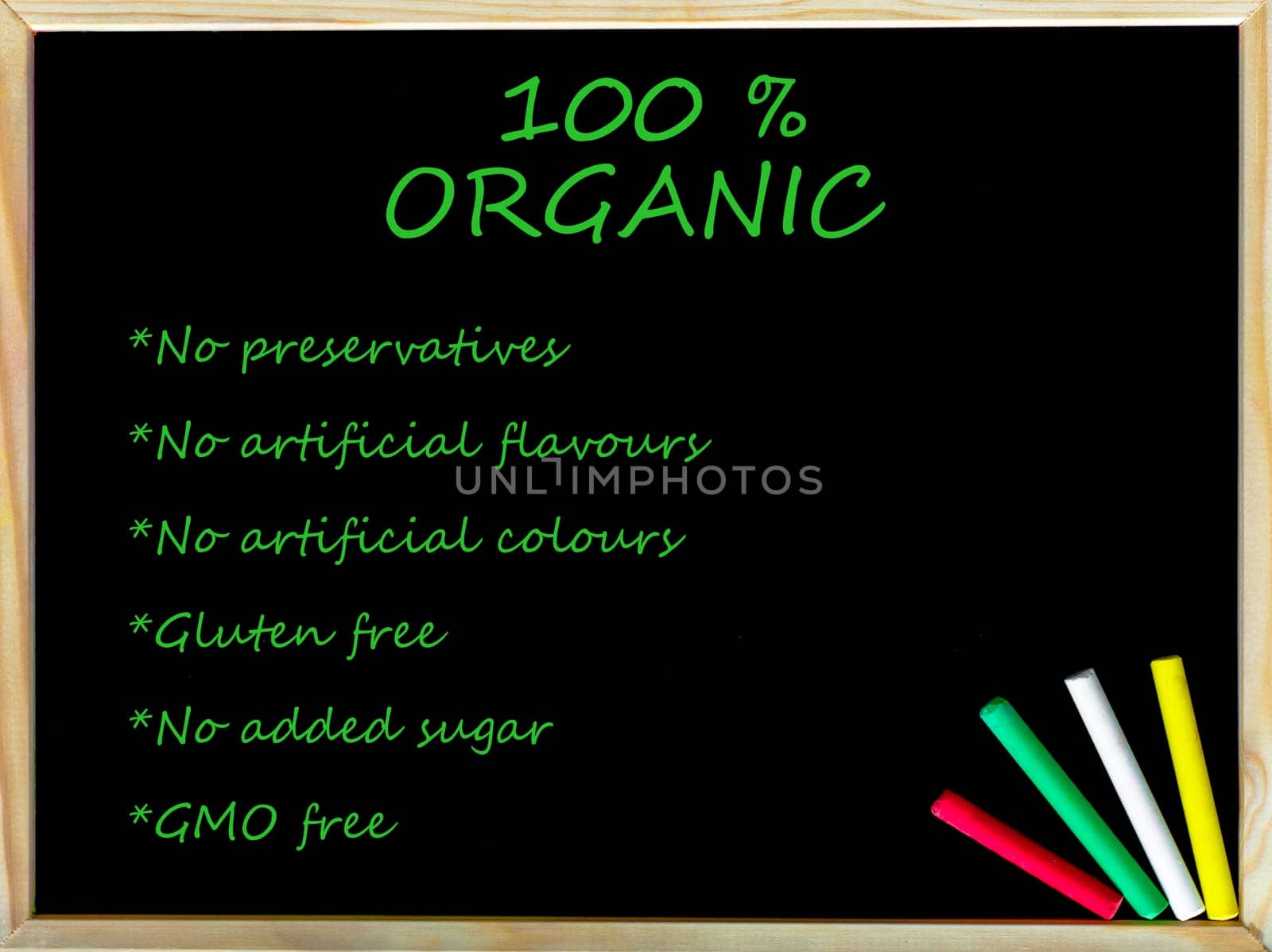 100% organic, vintage chalk text on blackboard, colored chalk in the corner, Healthy Lifestyle conceptual image