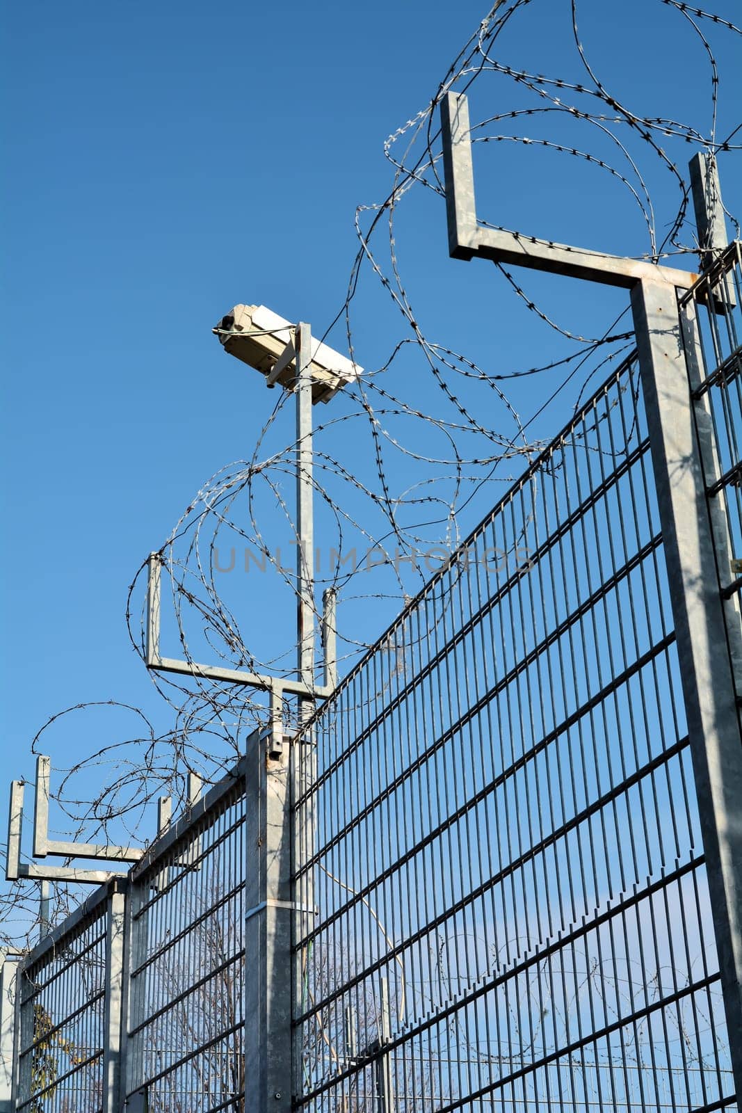 Barbed wire and video surveillance on a private property