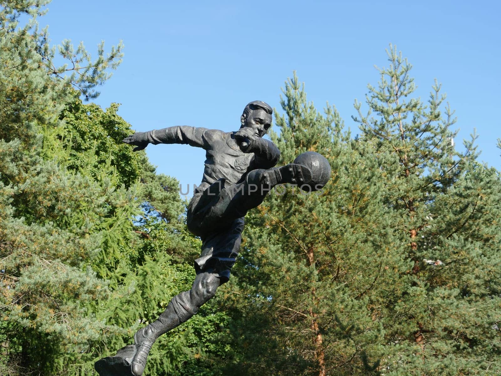 St. Petersburg, Russia, August 27, 2019 Monument famous footballer Vsevolod Bobrov,  football forward with the ball