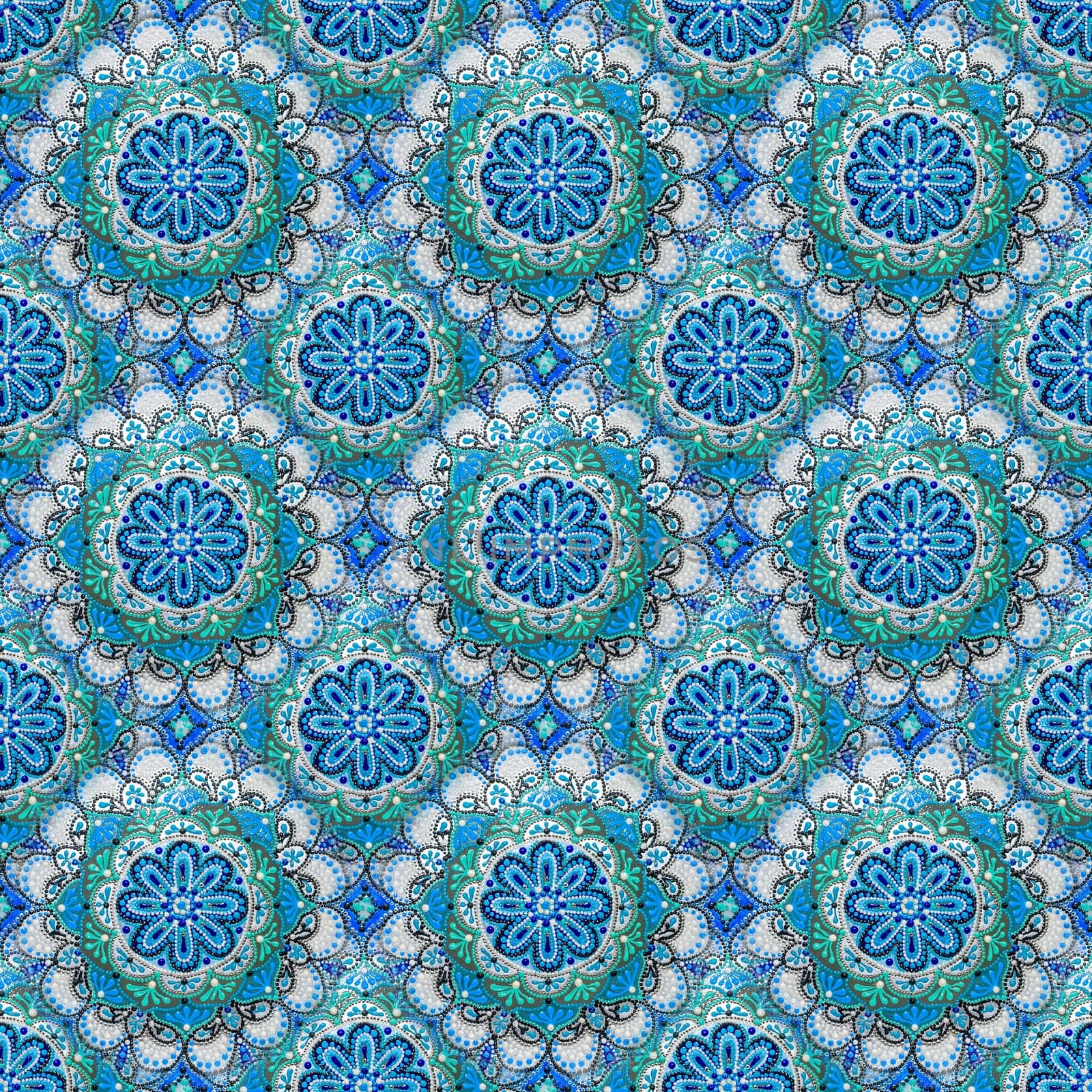 Seamless background from a set of decorative ceramic dishes hand-painted with acrylic paints with a floral pattern.