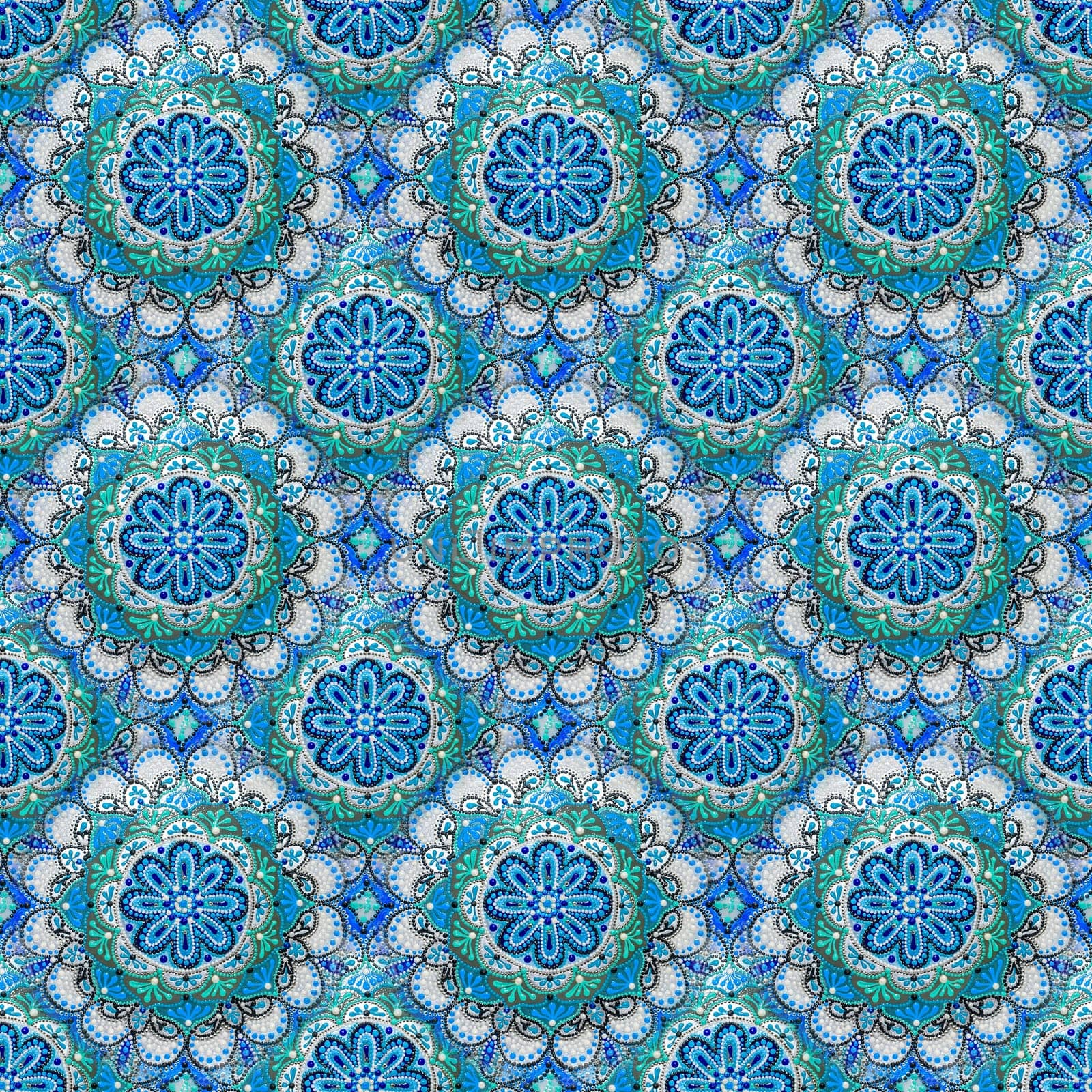 Seamless background from a set of decorative ceramic dishes hand-painted with acrylic paints with a floral pattern.