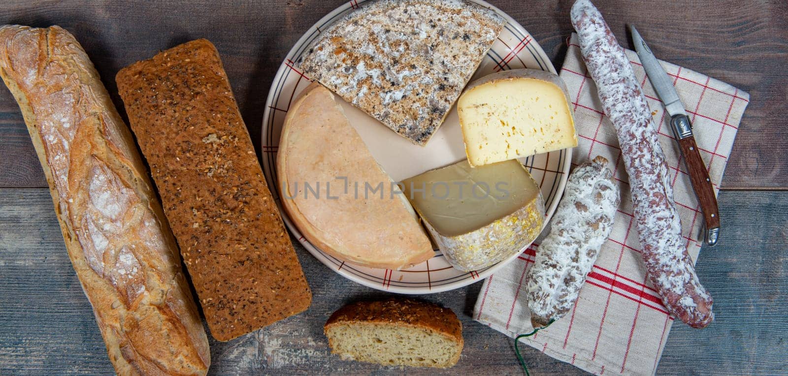 cheeses, sausage and Tomme de Savoie, Savoy, the french Alps France.