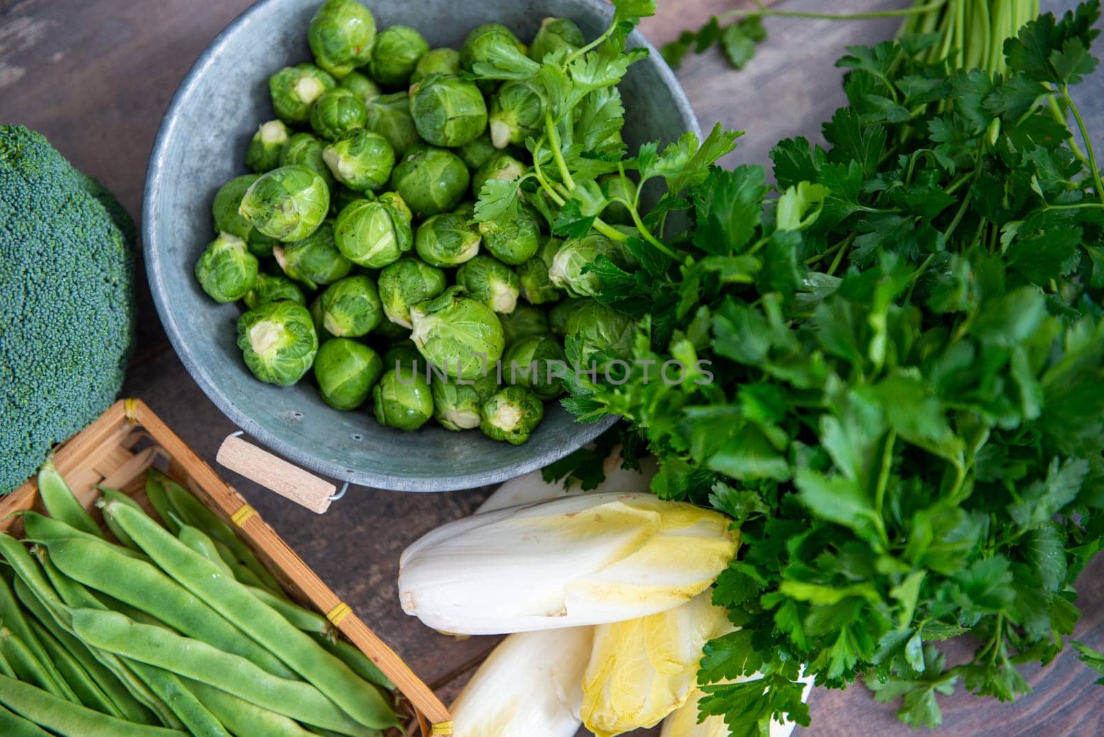 sprouts and endives on a wooden background, Belgian vegetables