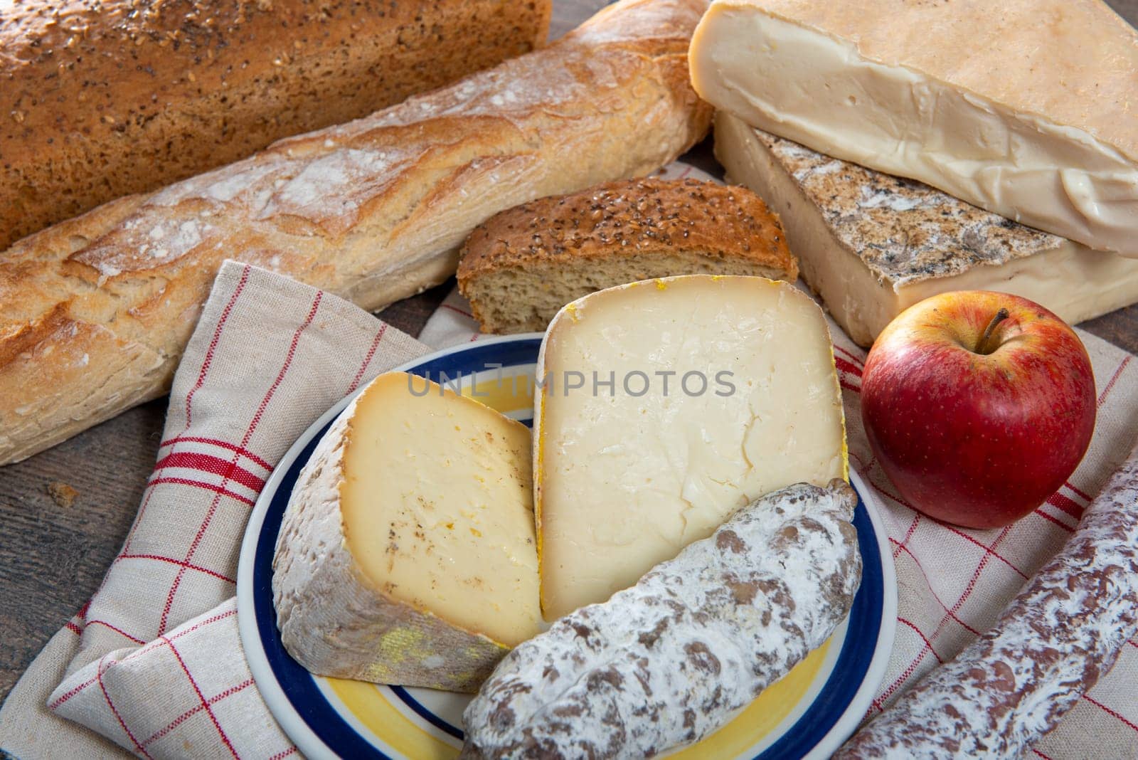cheeses, sausage and Tomme de Savoie, Savoy, the french Alps France.