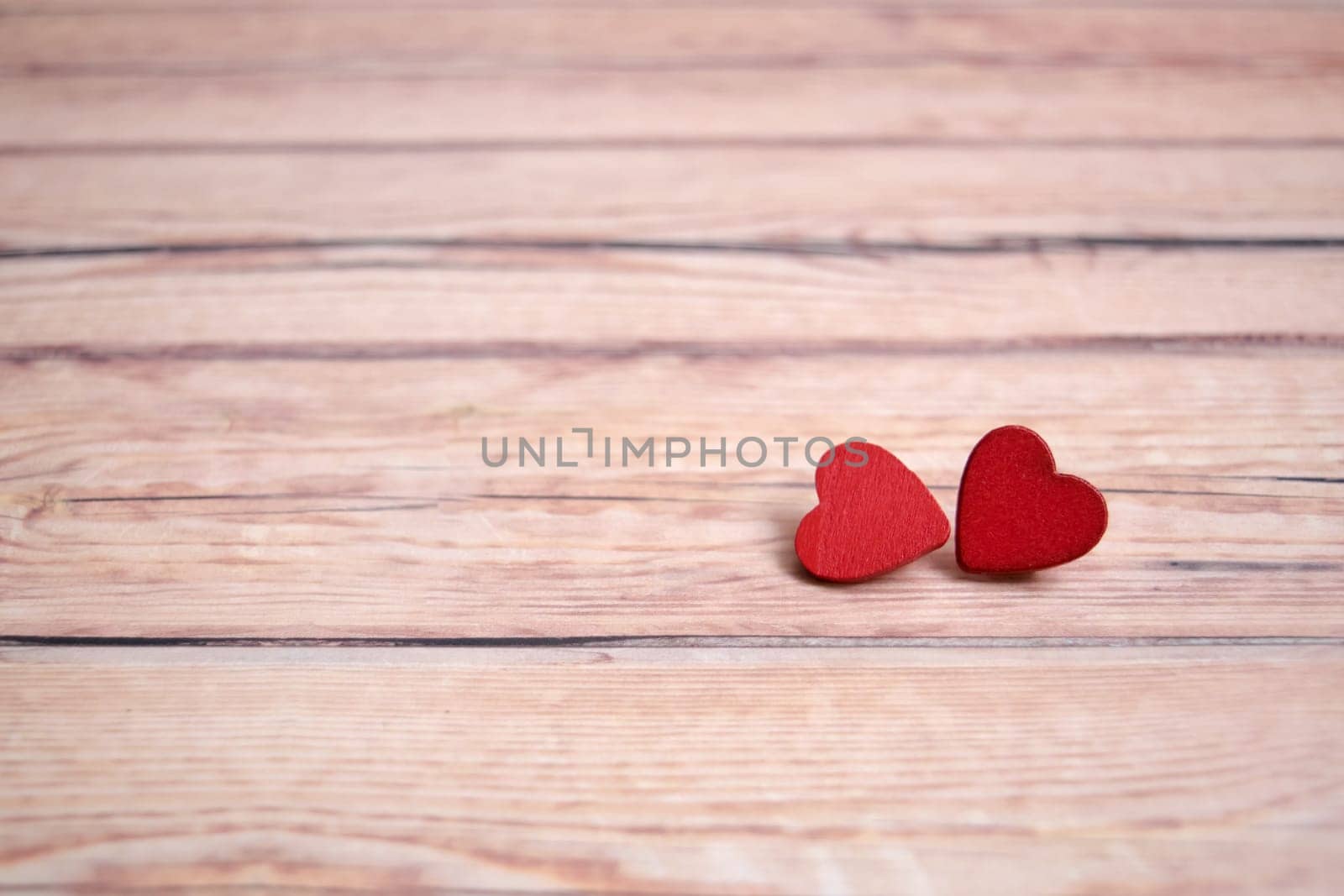 Valentines day card with red hearts on a wooden background, love message. Love concept. Romantic. Copyspace