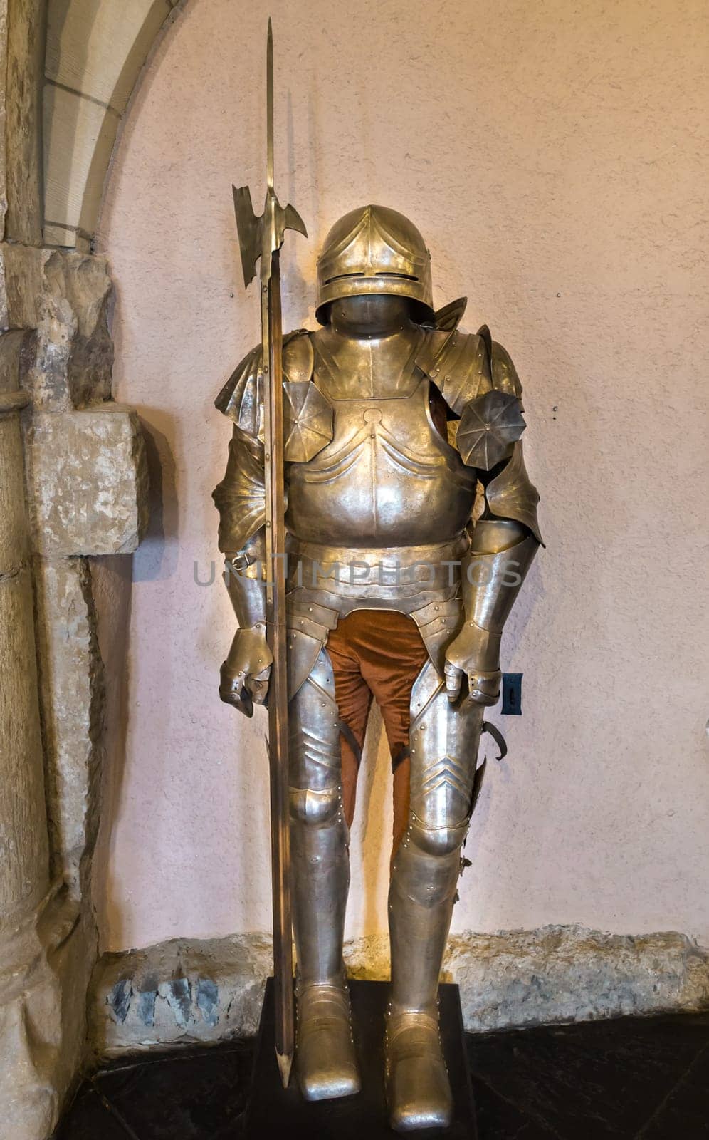 Knight's armor in old castle, ancient stone building, Europe. Traditional european architecture, famous places for tourism and travel, historical heritage