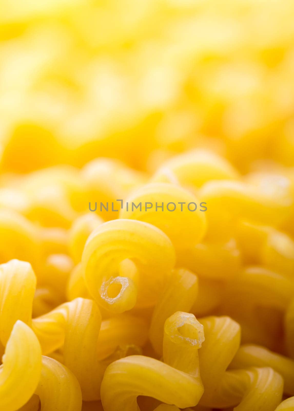 Macro view of yellow macaroni heap