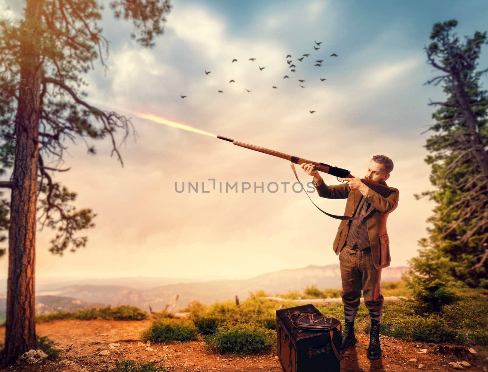 Duck hunter man in vintage hunting clothing aims an old rifle in forest. Hunt lifestyle, antique weapon