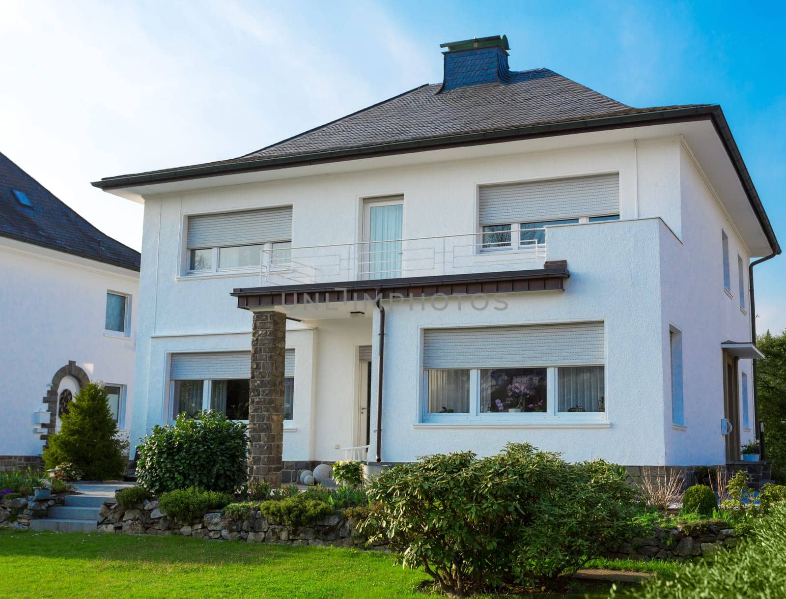 European suburban house against blue sky