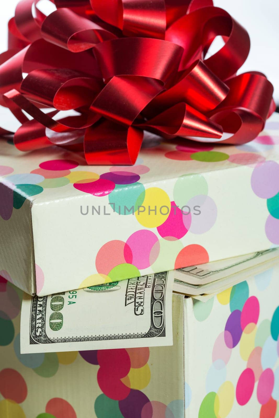 Gift box full of $100 dollar bills