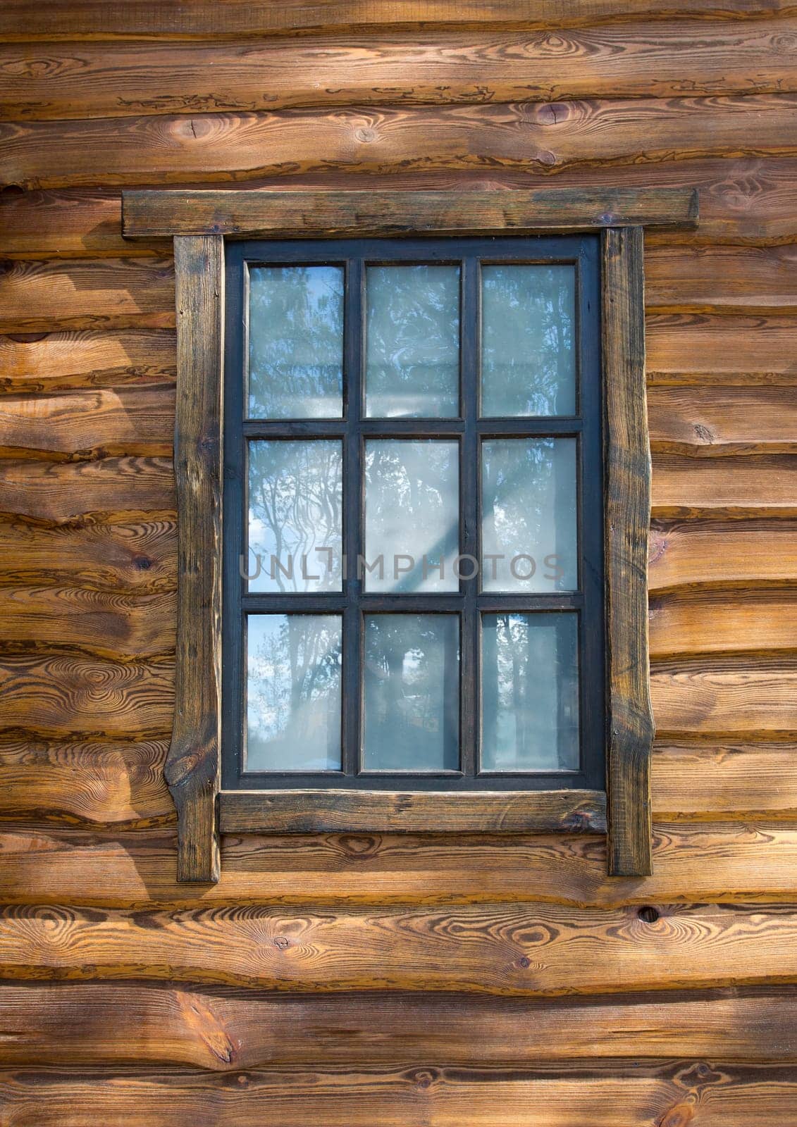 Vintage window on wooden wall