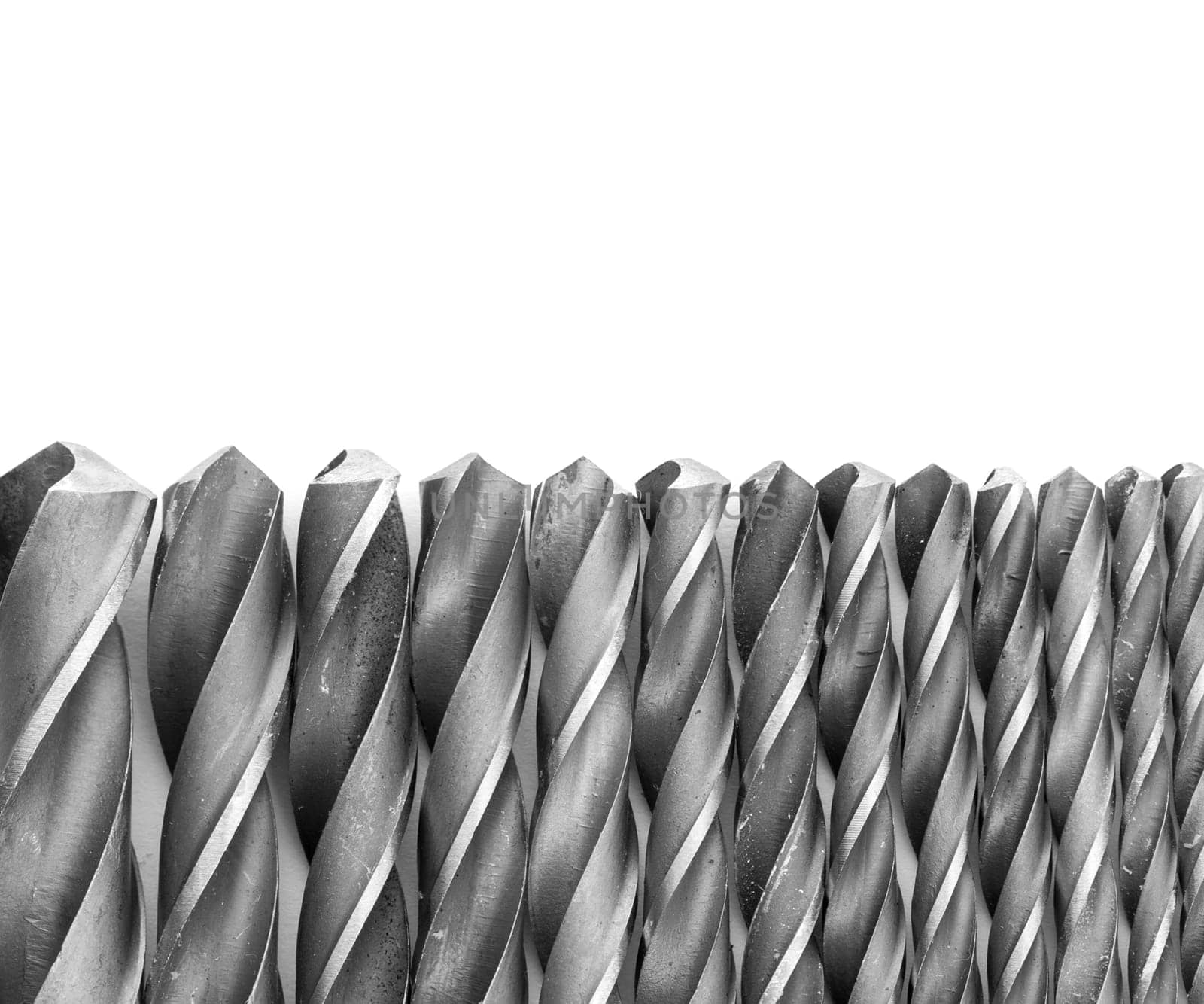 Drill bits isolated on white, macro