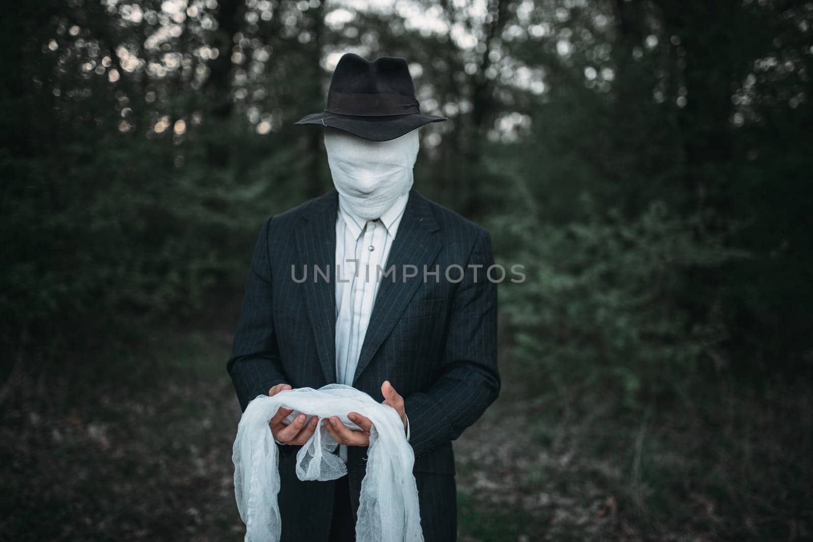 Serial maniac with face wrapped in bandages, bloody killer concept, crazy murderer, crime and violence horror