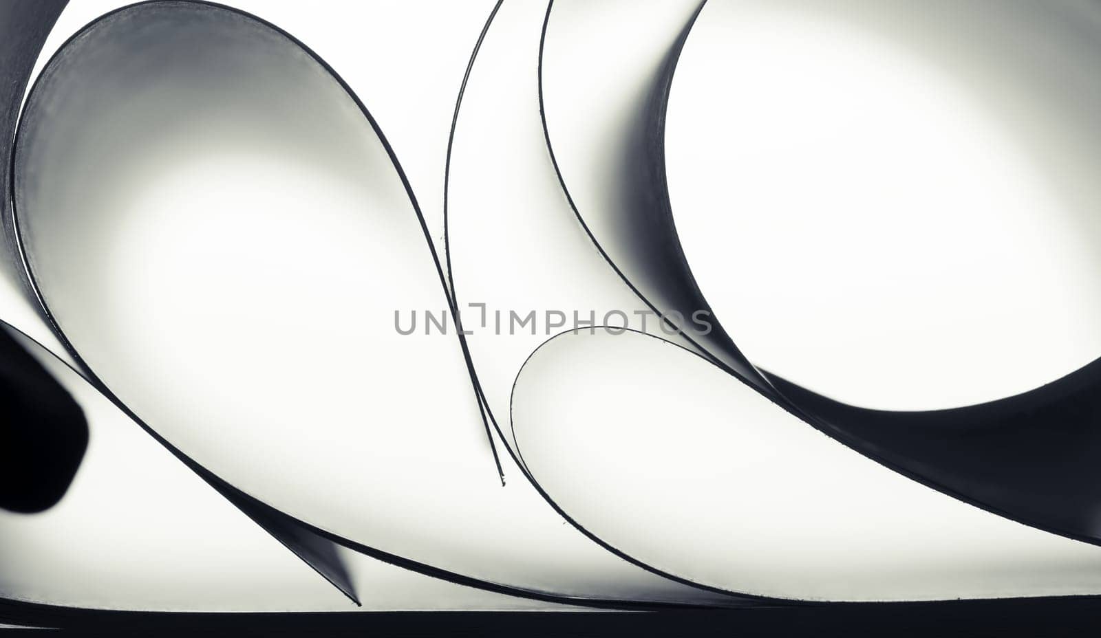 Abstract curves of paper sheets. Macro view
