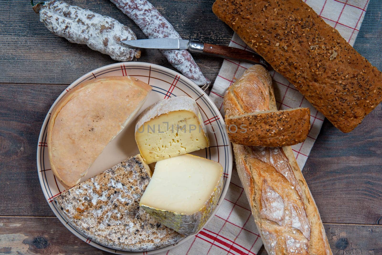 cheeses, sausage and Tomme de Savoie, Savoy, the french Alps France.