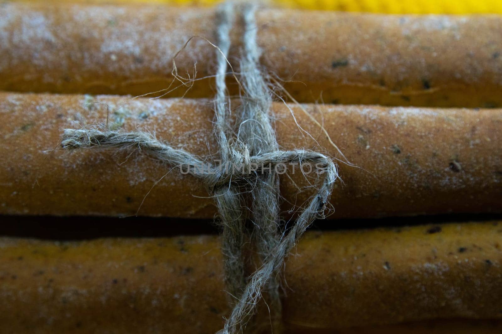 Women's hands mix the dough on a wooden table. Preparing bread for baking. Front views