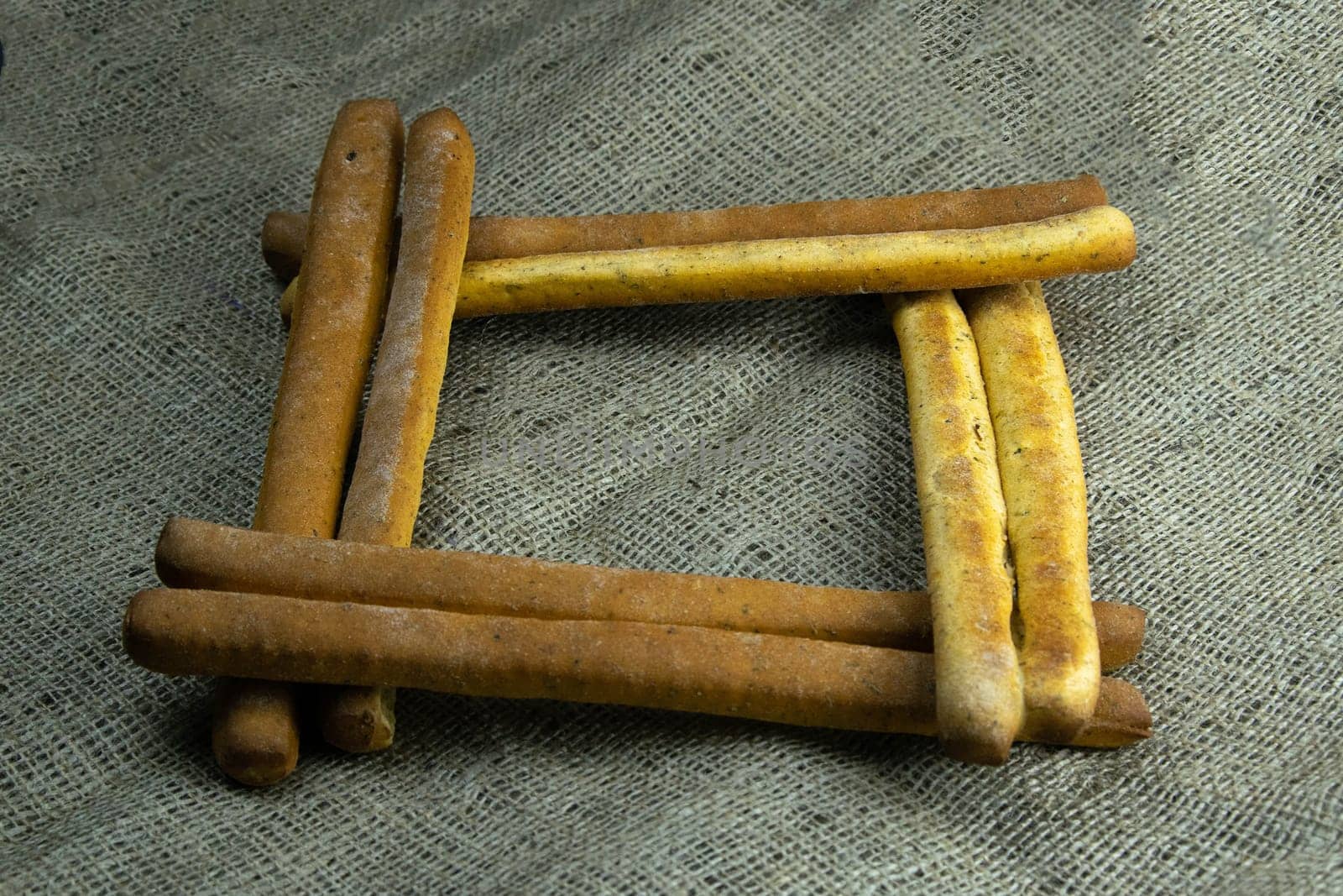 Women's hands mix the dough on a wooden table. Preparing bread for baking. Front views