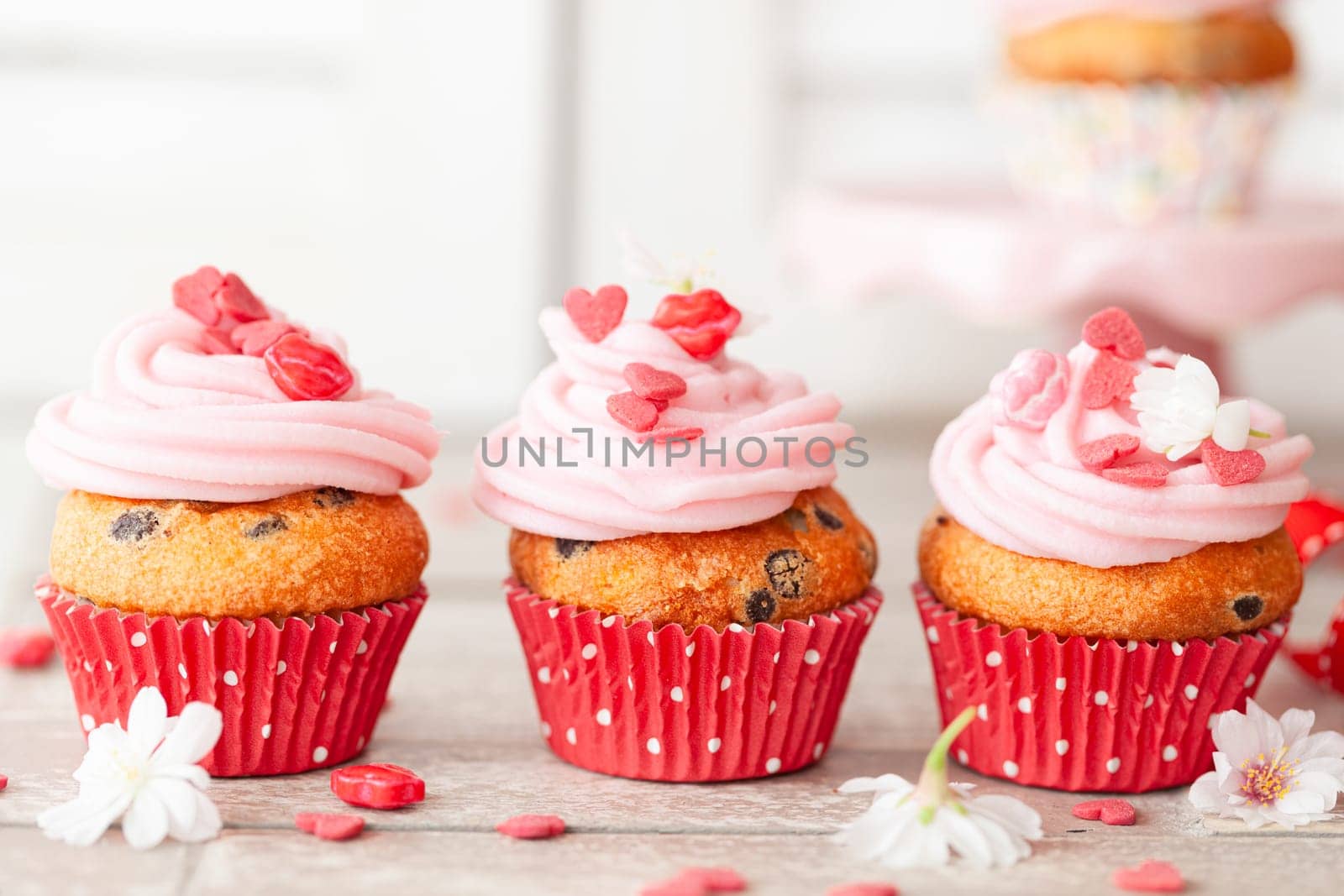 Little cupcakes with pink frosting for Valentines Day