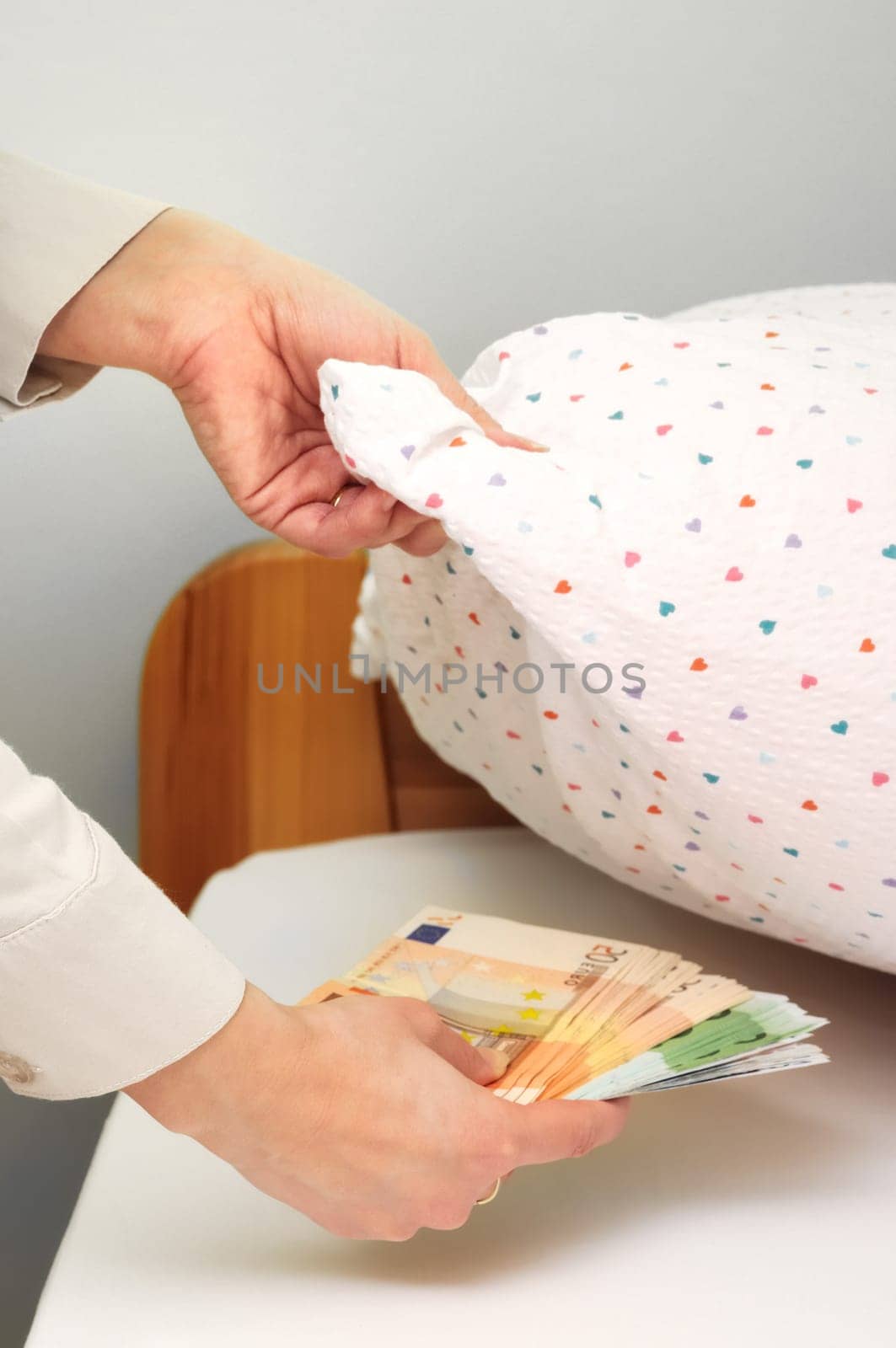 Woman hides money under pillow