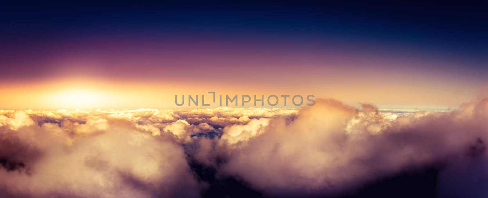Panorama of clear sky above the clouds and sunset