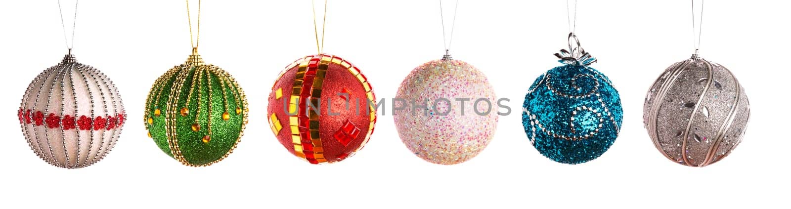 Christmas balls in a row isolated on white background