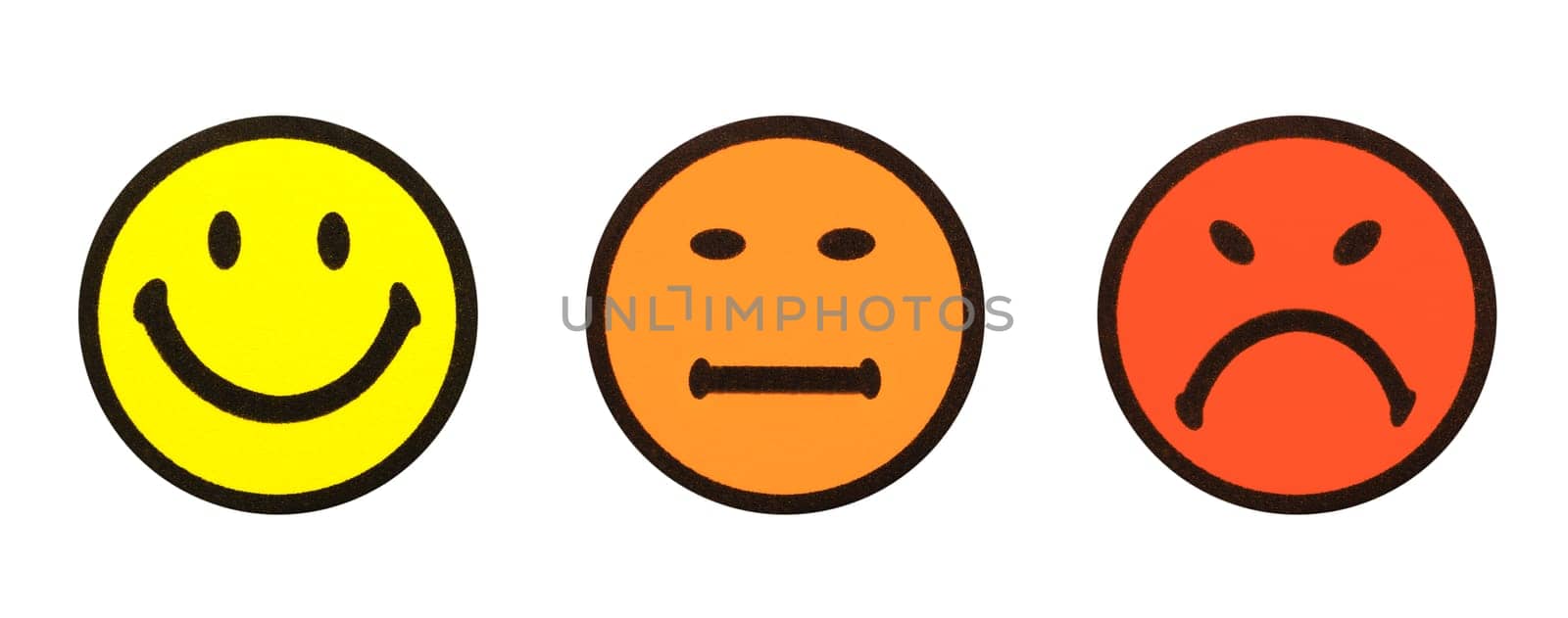 Close-up of three yellow smiley symbols