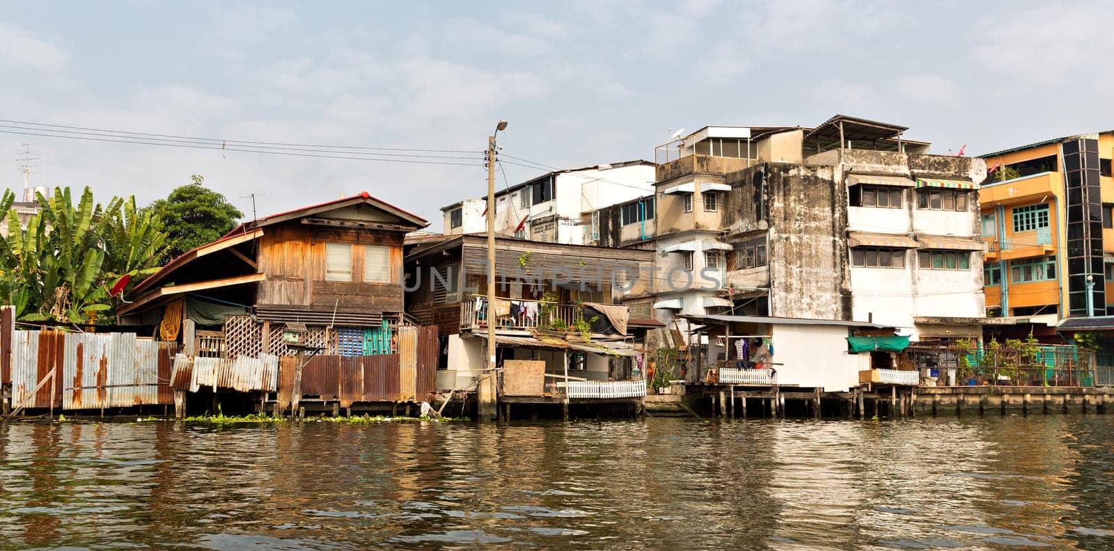 Shanty-town near dirty water in Bangkok