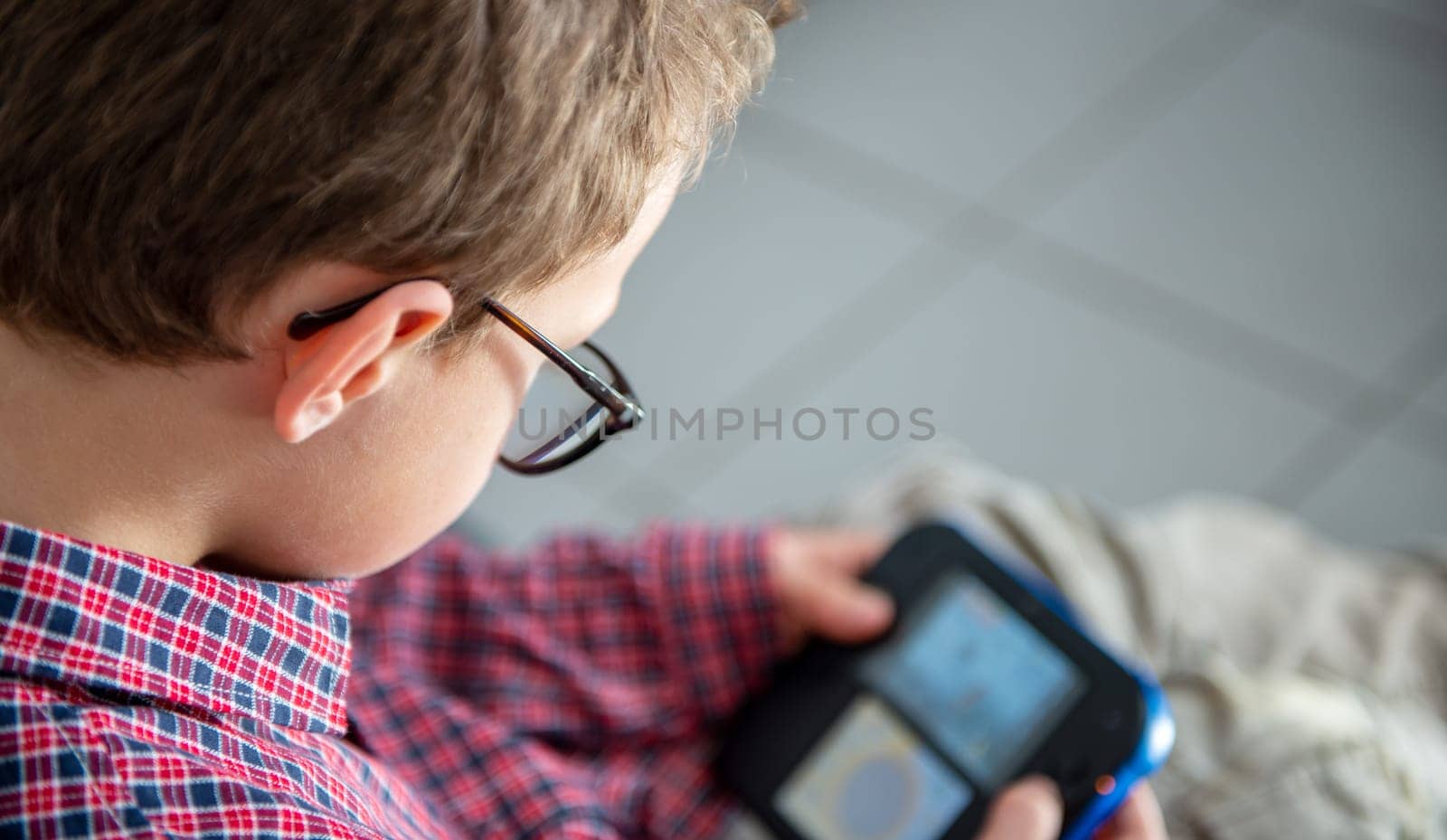 a child boy playing video game