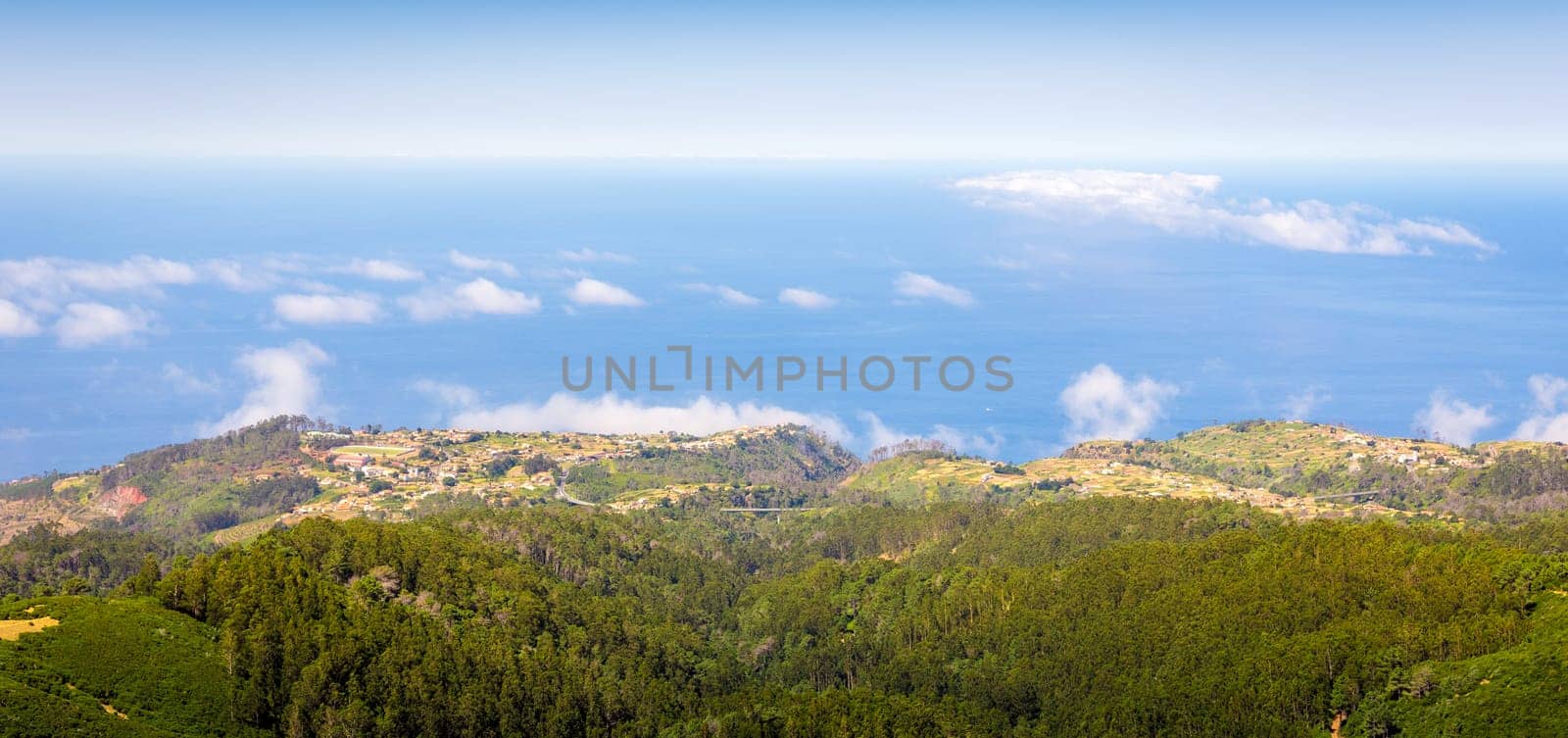 High view of green mountains in the sky landscape, Portugal, Madeira