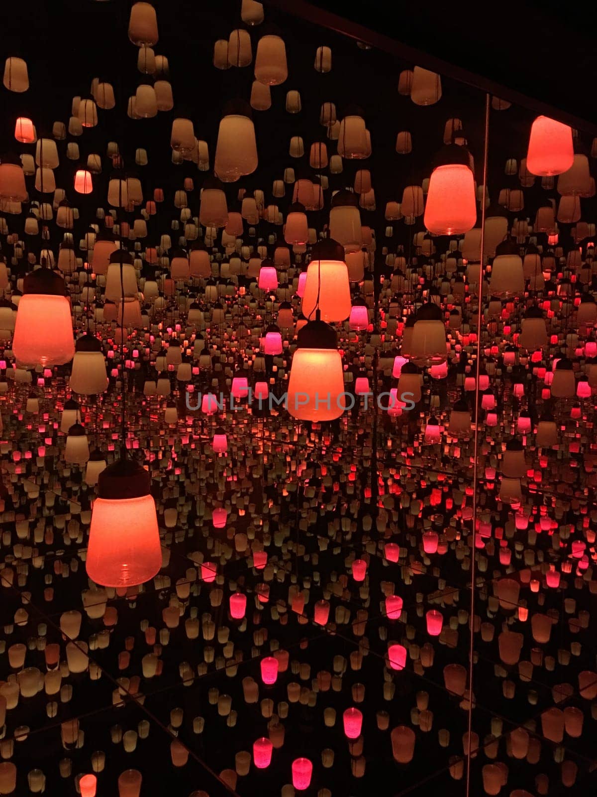 The performance art lamp in a room filled with mirrors.