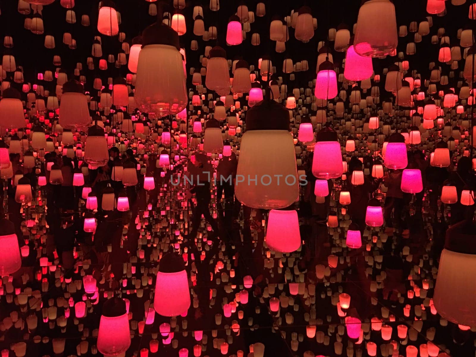The performance art lamp in a room filled with mirrors.