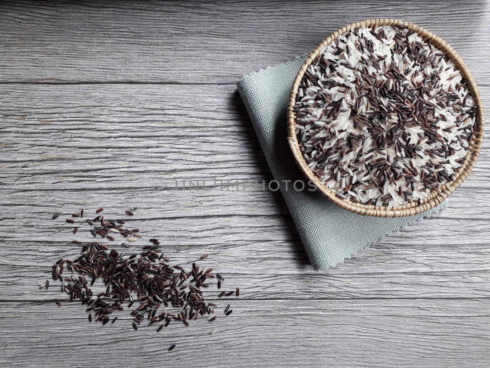 Jasmine rice and rice berry in rattan bowl