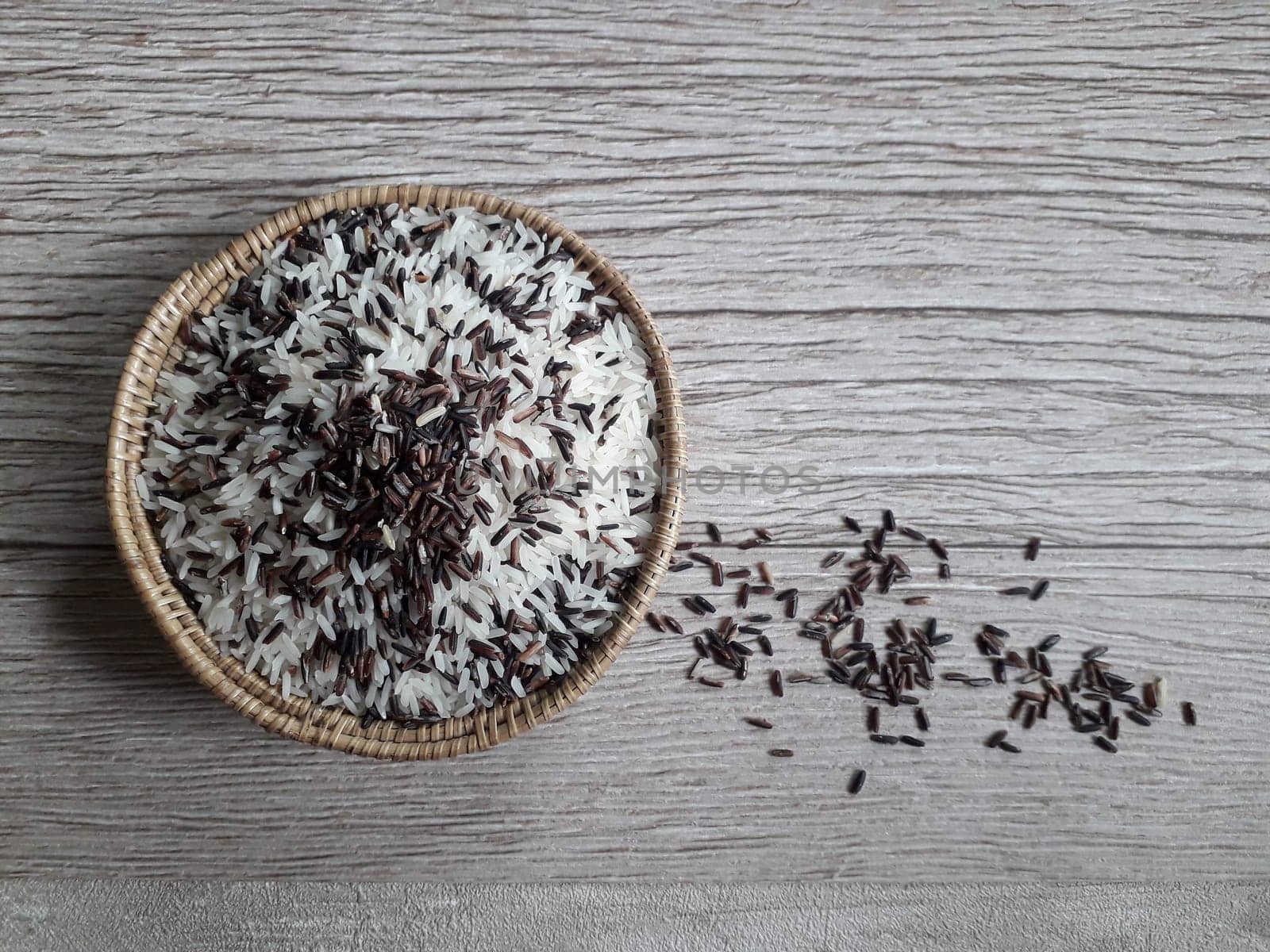 Jasmine rice and rice berry in rattan bowl