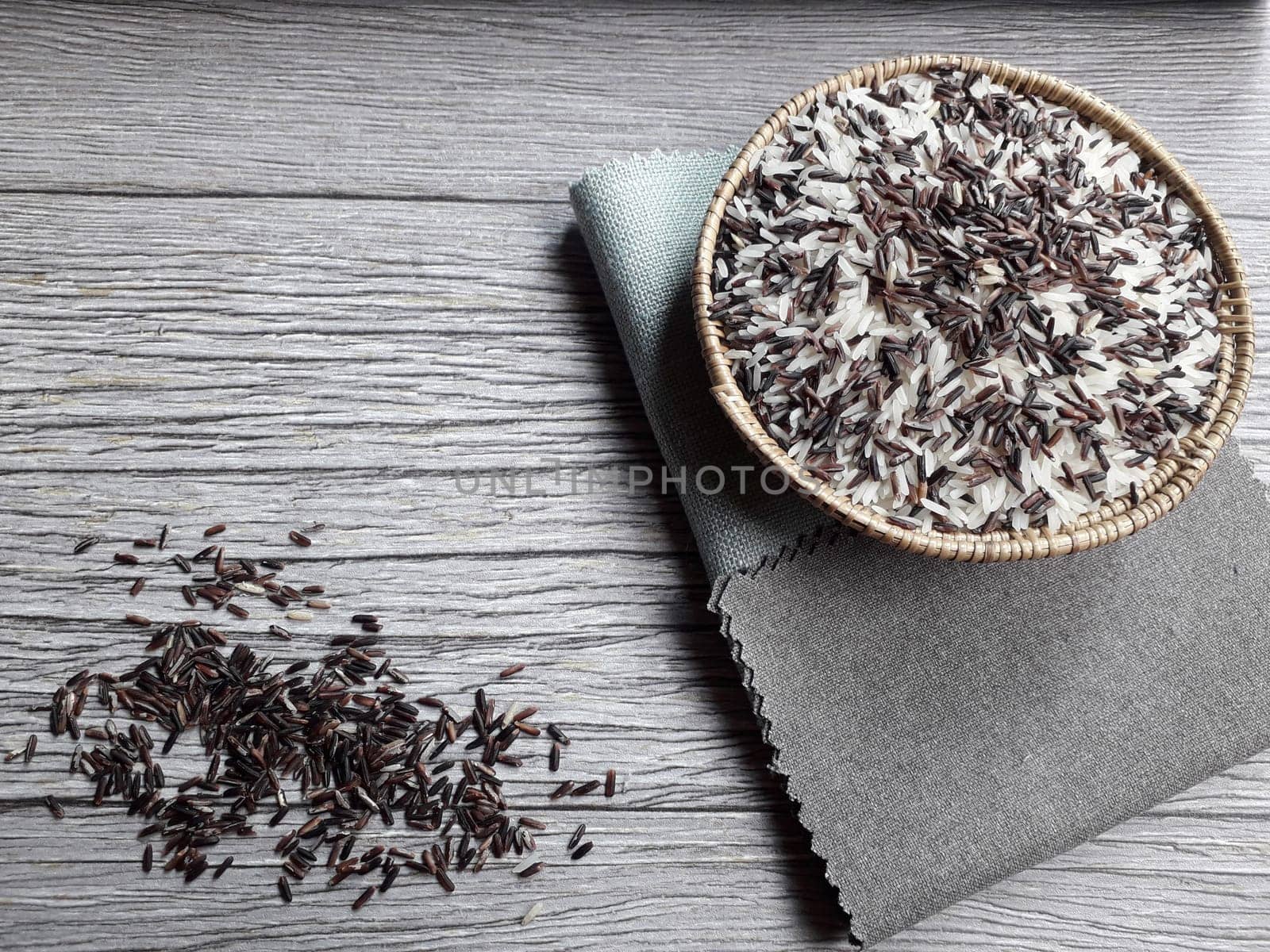 Jasmine rice and rice berry in rattan bowl
