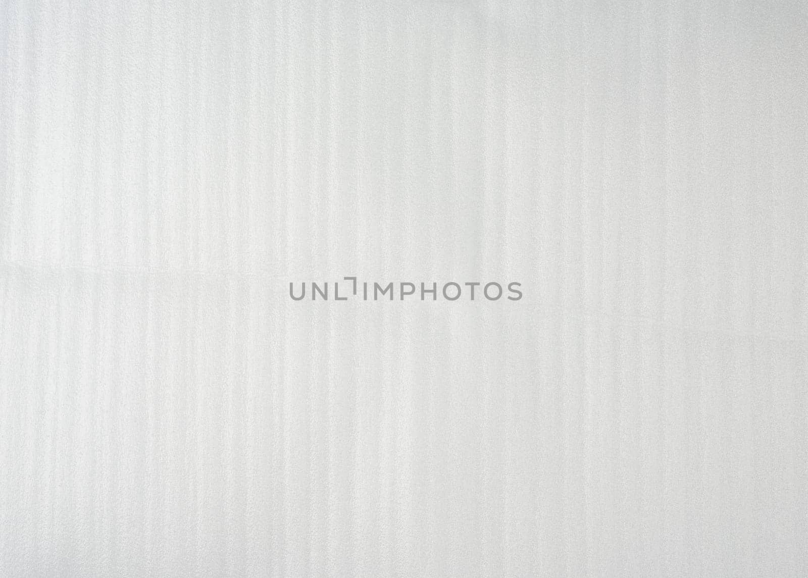 texture of white foamed polyethylene for packaging and transportation of fragile goods and things, full frame